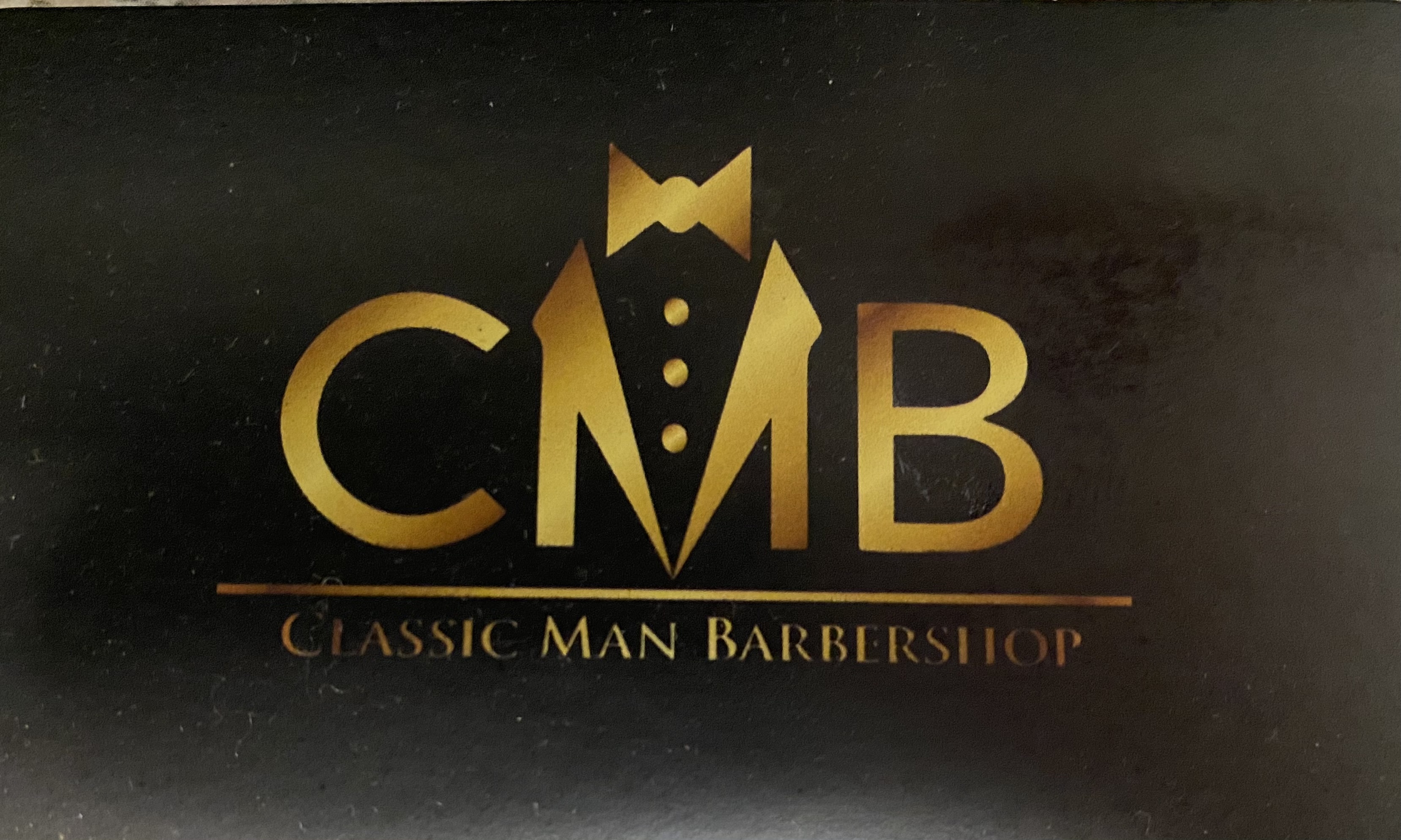 Classic Man Barbershop company logo